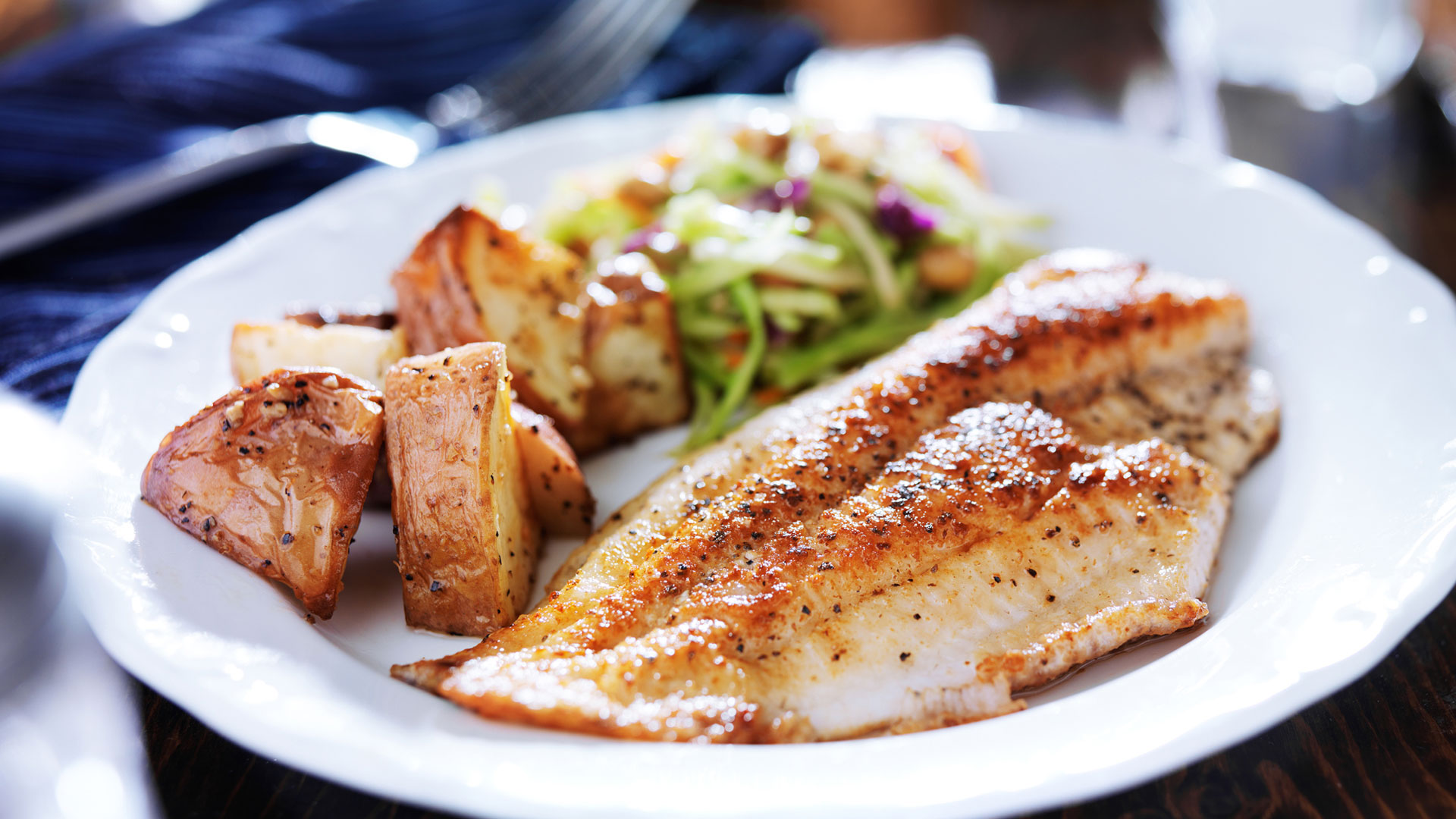 Plated heart-healthy fish and roasted potatoes served at Charter Senior Living of Jackson TN.