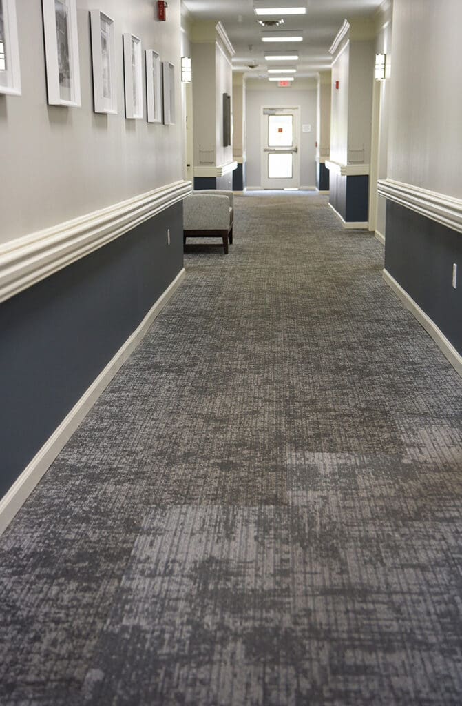 hallway with seating and artwork