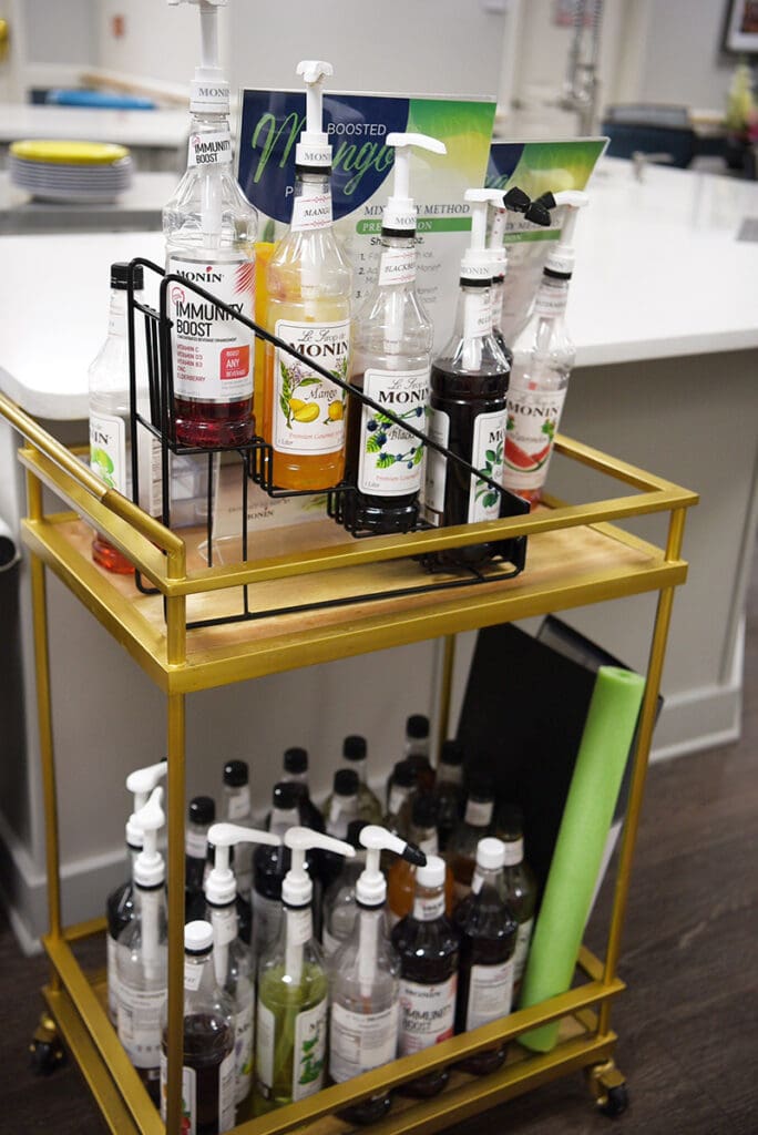 cart full of variety of beverage flavoring