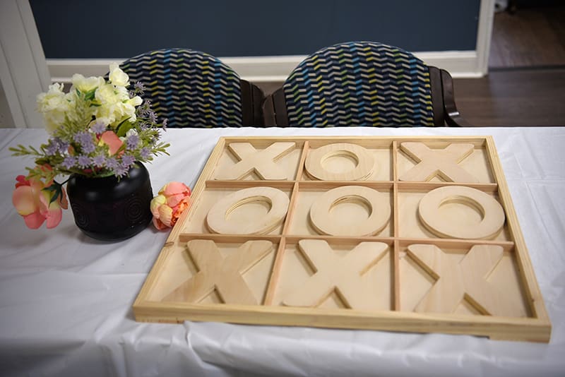 large wooden tic tac toe game